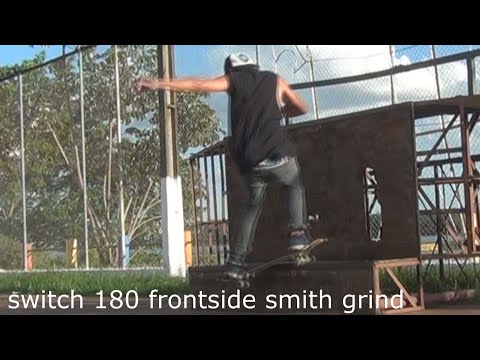 skateboarding: switch 180 frontside smith grind