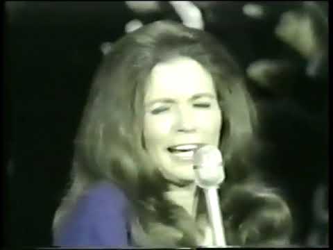 Johnny Cash and June Carter Cash sing "Mama don't allow it"