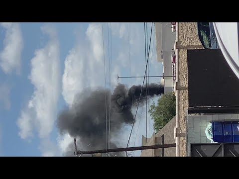 Firefighters respond to a dumpster fire