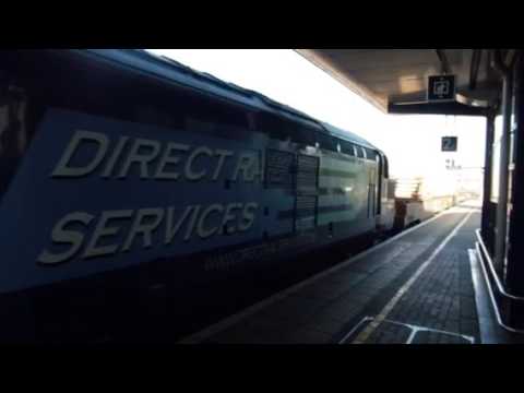 DRS class 37069 leads 37259 through Ashford with the nuclear flask wagons.