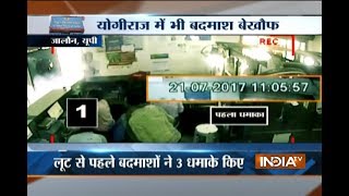 Masked men blast bombs, loot Rs 5.50 lakh cash from a bank in Jalaun