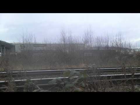 DRS 37610,37611 ON 6M56 ARRIVE AT GLOUCESTER YARD WHILST COLAS 70809 WATCHES 180215