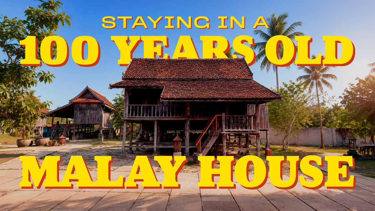 We stay in a century old Malay village for a night!