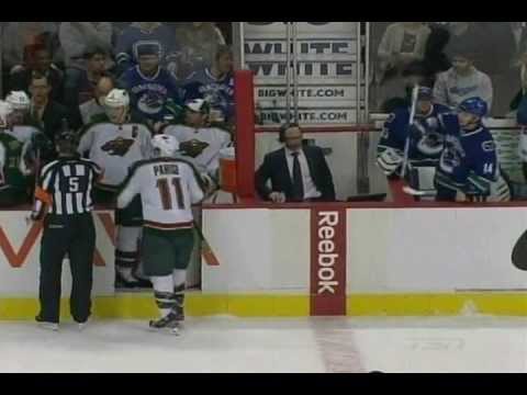 Mikko Koivu Takes Out Alex Burrows' Glove (February 12 2013)