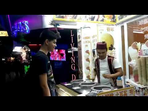 Shashwat at the Turkish icecream stand in Bangkok