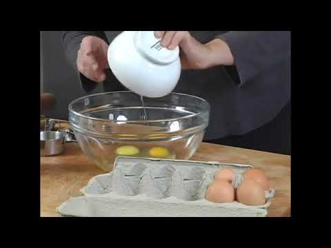 Adding Eggs & Pumpkin To Pumpkin Pie Filling