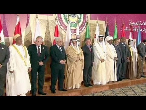 Arab League gives Syria chair to rebels and will give military support