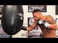 REGIS PROGRAIS SHOWS YOU HOW TO THROW SOUTHPAW COMBINATIONS ON THE HEAVY BAG LIKE A PRO