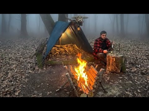 Winter Camping in Rain; Survival in the Wild. Bushcraft Shelter