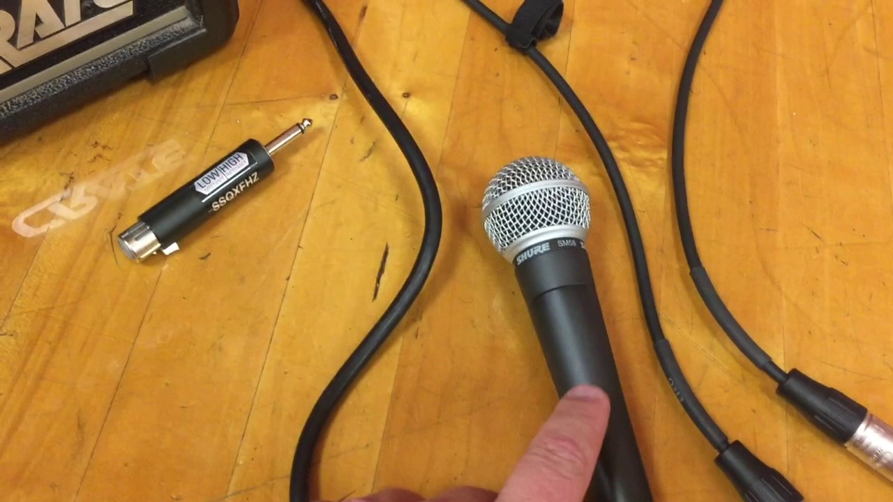 Is it ok to plug a mic into a guitar amp?