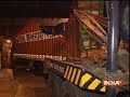 Speeding truck gets stuck under railway bridge in Mumbai