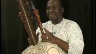 Mady Kuyate sings and plays a unity song on the Kora