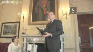 Pair with the wine bottle trick and a feathered hat for a boatload of fun. (Click through to watch.)