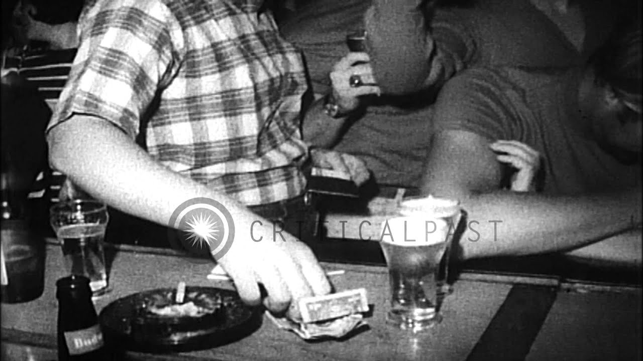 College students dance, drink beer and enjoy on a beach at term end in Fort Laude...HD Stock Footage