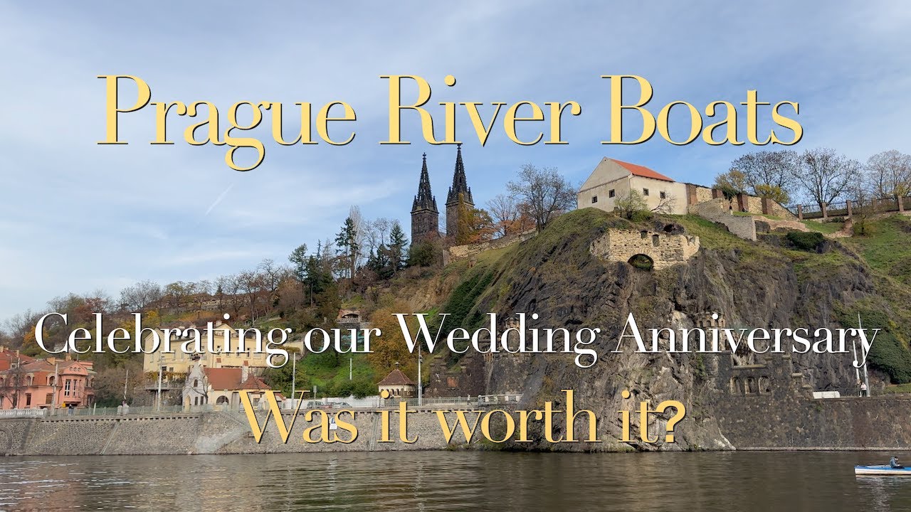 Glowing Prague Castle cinematically mirrors on the water, while the Charles Bridge's architectural silhouettes and the boat's gentle wake enchant the evening sky.