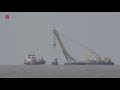 Wrak van de Urker kotter UK-165 boven water gehaald
