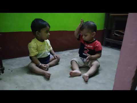 Funny kids Adeeba and Sakib playing with together.