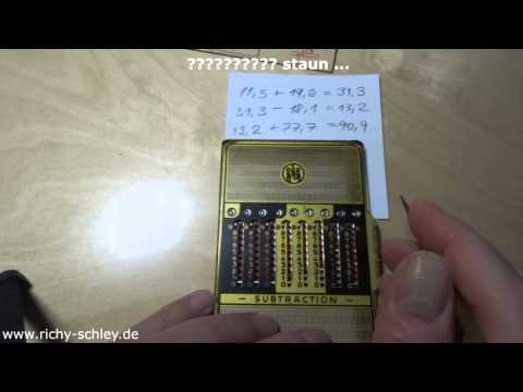 Taschenrechner Zahlenschieber "Addiator Duplex" Addition Subtraktion Beispielrechnung