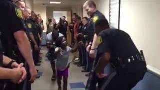 A little girl was refused a hug from a cop; another police department found out and made up for it