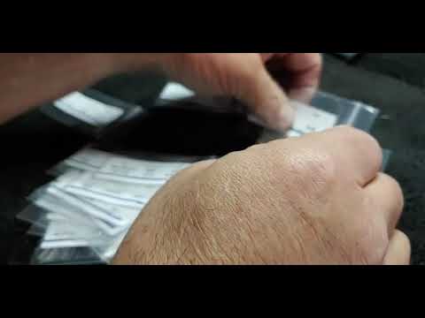 A Review The Midwest Model Shop's 1/200 Trumpeter Titanic Acetate Window set and their t shirts.