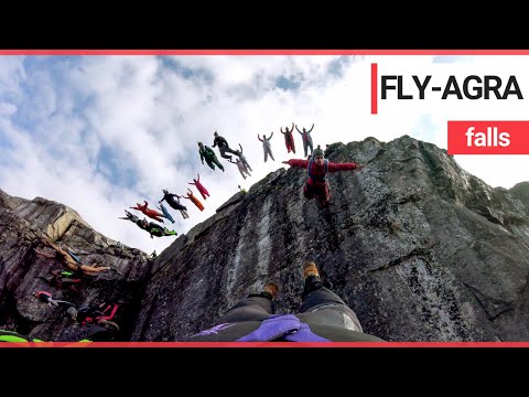 BASE jumpers’ leap from a cliff face in a formation | SWNS