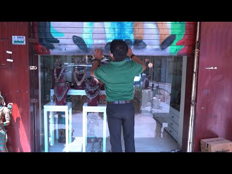 Indian businesses begin to reopen | AFP