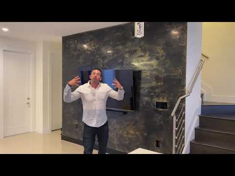 Venetian plaster accent wall black marmorino with gold wax, Exotic Wall finishes