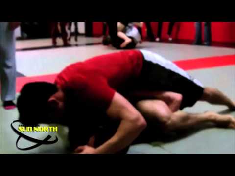 2) u70kgs Novice - Paul Schofield (Evade-Combat Base) vs. Bon Pierre (Big Kat MMA)