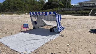 Setting up a Tommy Bahama beach tent for ultimate shade