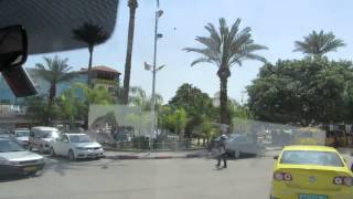 preview picture of video 'Drive to the center of Jericho. Tour guide: Zahi Shaked. April 2, 2014'