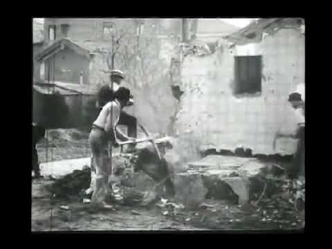 The First Reverse Motion in Film - Demolition of a Wall 1896 by LOUIS LUMIERE
