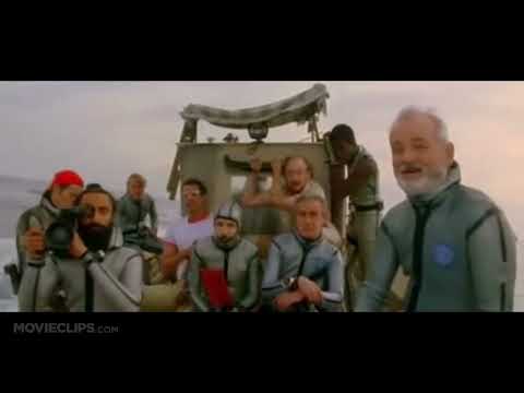 Trailer end-card frame: walk-and-wave tableau that mirrors the film’s end-credits march to Bowie