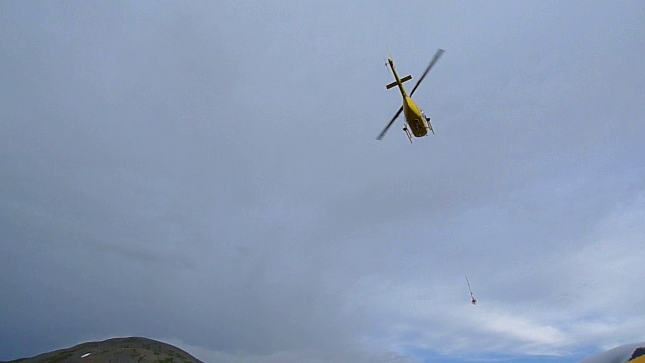 Helicopter logs delivery (Long Lake Yukon)