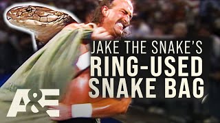 Download lagu WWE's Most Wanted Treasures: Jake The Snake's INFAMOUS Snake Bag | A&E mp3