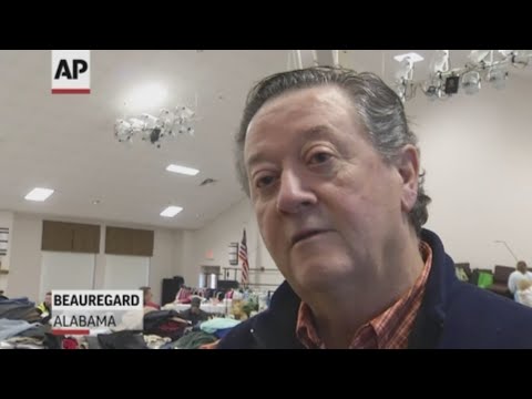The coroner and a minister held 17 separate meetings with the relatives of the 23 people who died in weekend tornado in Beauregard, Alabama. (March 6)
