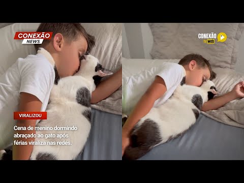 Vídeo: Cena de menino dormindo abraçado ao gato após férias viraliza nas redes.