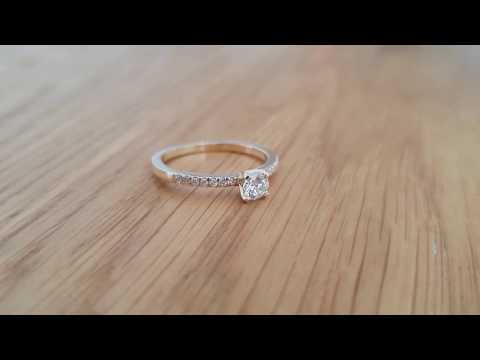 A video of A Classical Engagement Ring Studded With 0.40 CT