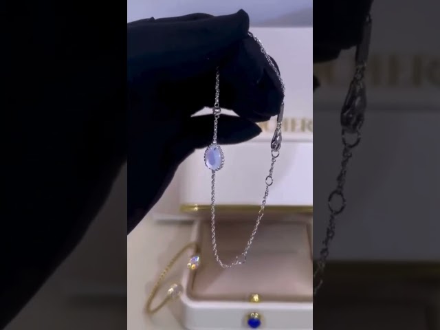 اسوارة الدمعه بحجر طبيعي والماسه من بوشرون ذهب عيار 18 بتصميم فاخر