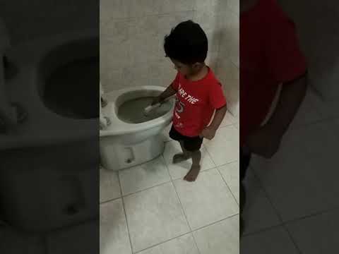 Naayel Cleaning Toilet