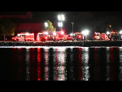 Emergency vehicles near Washington airport after plane crashes in Potomac River | AFP