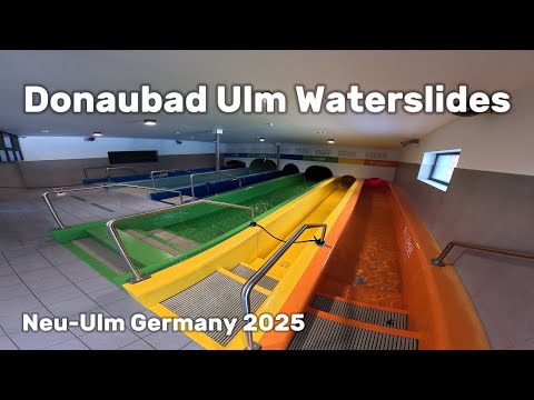 Waterslides in Water Park Donaubad Ulm Germany, POV 4k