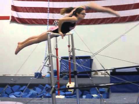 Slow motion glide kip on bars