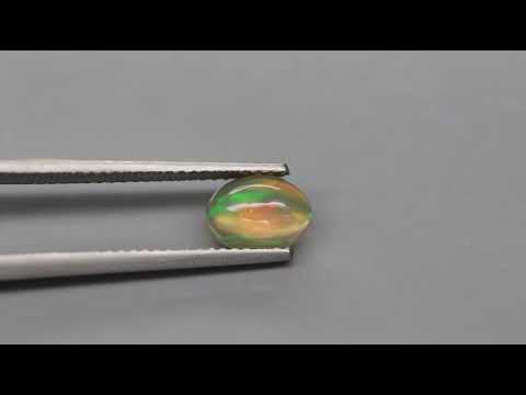 Natuurlijk Opaal Cabochon Kleur Multi Color, oranje groen geel violet blauw knipperend 0,74 ct.