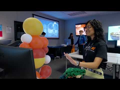 A frame from the embedded video, with a play button over the image.