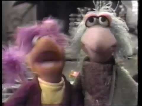 Vintage Fraggle Rock trailer still with the Fraggles singing in the Great Hall, signaling the music-first design of the series