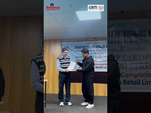 BBA Students receiving Paid Internship Certifiate of Reliance Retail. Top BBA College in Patna, IIBM