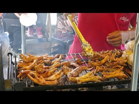 Lima Street Food, Peru. Grilling Chicken Feet Patas de Pollo a la Parrilla