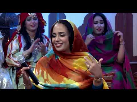 "منى دندني   "كلمة ورد غطاها