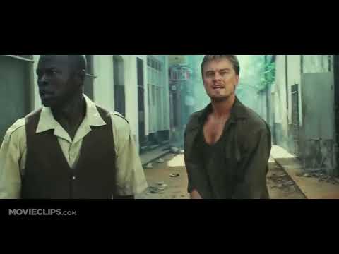 Blood Diamond trailer frame: street uprising and civilians fleeing amid smoke