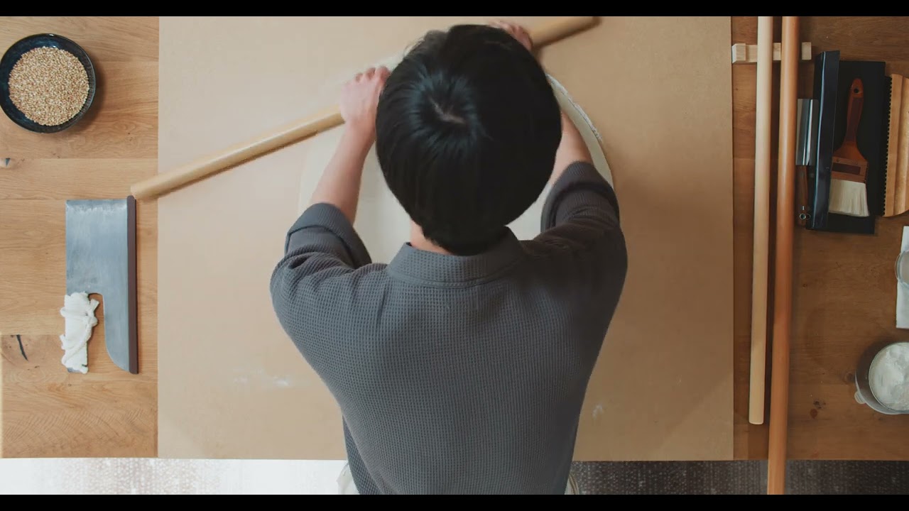 MAN CHEF PREPARING ROLLING PIN 4K